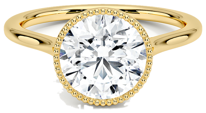 Anillo de compromiso en oro amarillo con diamante redondo